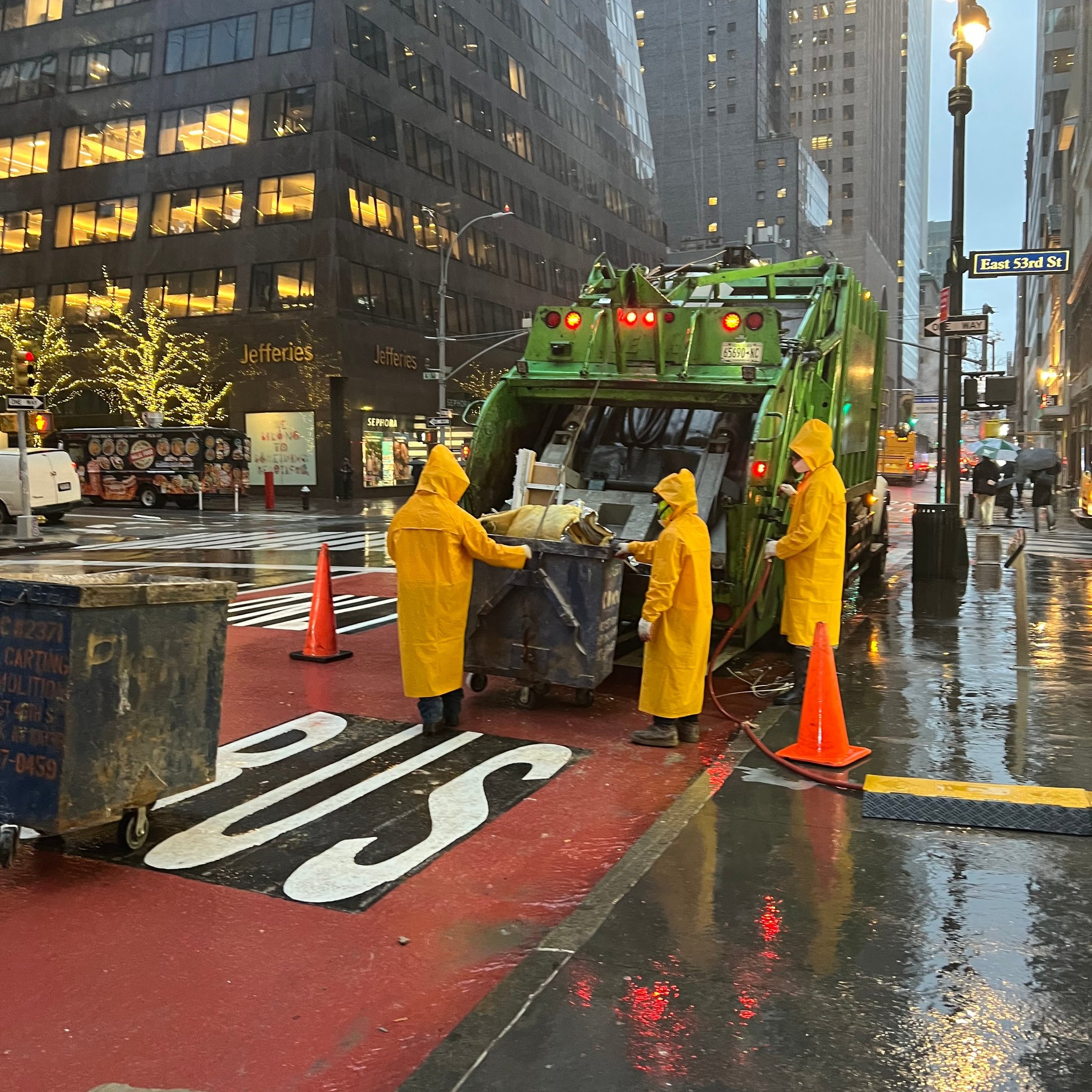 Andrew Horan on a NYC demolition site reviewing a live public dashboard that shows environmental and